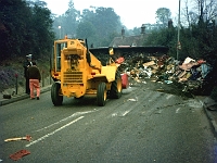 Roydon Road Stanstead Abbotts. Yet another calamity at the bottom of Cats Hill. After many hours the trailer was finally turned upright and reloaded. The lorry went another 100 yards and then stalled. A breakdown team finally managed to restart it. Photo about 1980 ?