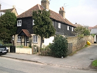 There are three dwellings here, all neatly compacted into one buiding. Full of character and rather cosy. Photo 2009.
