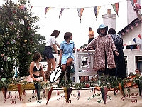 Womens Institute float by Queens Head pub. The lady in the smock dress is Liz Carter who kindly took care of me one night, when I was "slightly innebriated" after a session in the Village Club. Sadly no longer with us. The chap on the pub roof is Ted Chandler. Photo 1970's.