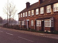 These cottages still remain but the farm land to their right is now houses. Roydon Road around 1980.