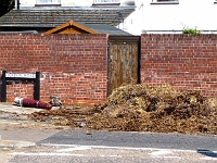 Trailer load of manure spills on to the Roydon Road. Another bollard uprooted. April 19th 2011