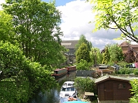 The Mill stream, bottom of Glenmire Terrace. Once used to convey cargo to the malt industry in the village. Now a quiet backwater. Photo 2005.