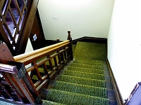 Second floor. Note the gate on the left to shut the stairway off