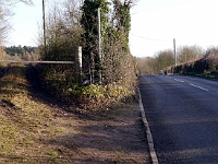 The "new road" to the right, the old road to Stanstead Abbotts to the left. Hollycross Road, December 2012.