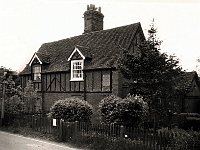 Manor Cottages, Cappell Lane. The cottage on the left, No: 24, used to be the old police station. There are bars at the window but whether to keep people in or out is debatable. The bars are not there now (2010). Photo taken 1987.