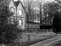 Larch Cottages with the Meridian post in the foreground. Hollycross Road. Photo 1987