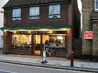 Royal Chef Fish Bar, High Street Stanstead Abbotts. Formerly the "Carpet Mill" and many years ago "W. W. Ray, general shop," and before that it was "Blackaby's Post Office. Also known as "Winston House". Photo 2005