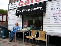 The Village Pantry, 2010. Helen Lovick enjoying an early morning cuppa.