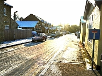Millers Lane, Stanstead Abbotts. Treacherous road conditions, sheet ice, Feb 2010.