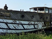 The Marina, South Street, Stanstead Abbotts. A sad resident that once would have been a beautiful craft. With lots of TLC it may one day be restored to its former glory. Photo May 2010.