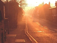 Sunrise in the High Street Stanstead Abbott.From Stanstead Bridge, Photo 1985