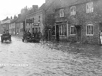 Flooded High Street around 1920.