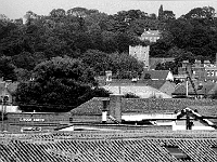 Across the roof tops. Hill House at the back, Saint Andrews Church, Stanstead Hall on the right, and Woods Paint factory in the left foreground. Photo 1987